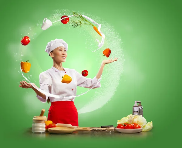 Juggler female cook — Stock Photo, Image