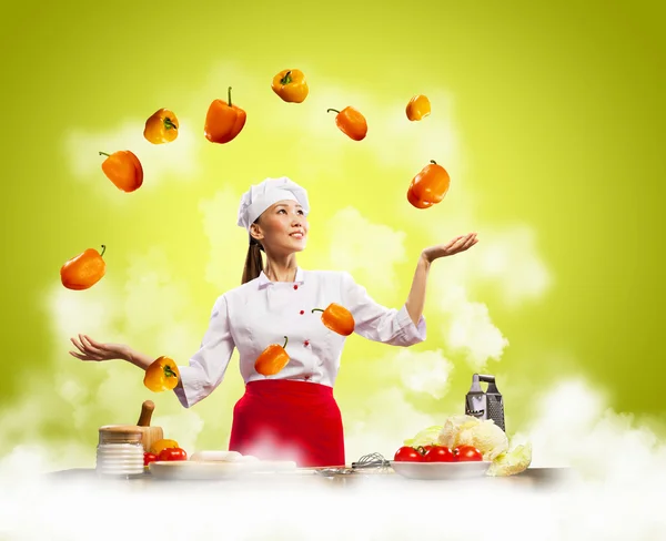 Juggler female cook — Stock Photo, Image