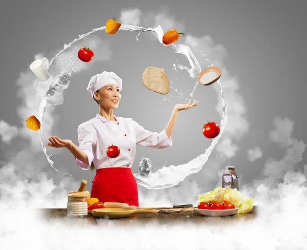 Giocoliere donna cuoco — Foto Stock