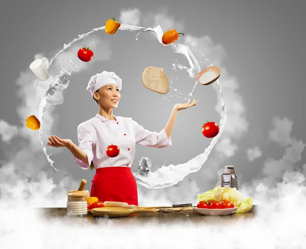 Juggler female cook — Stock Photo, Image