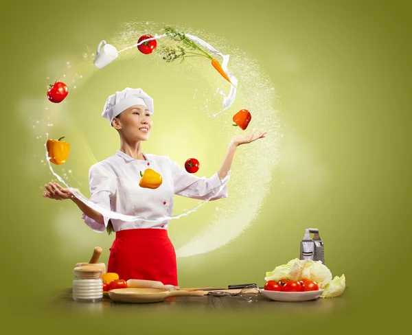 Juggler female cook — Stock Photo, Image