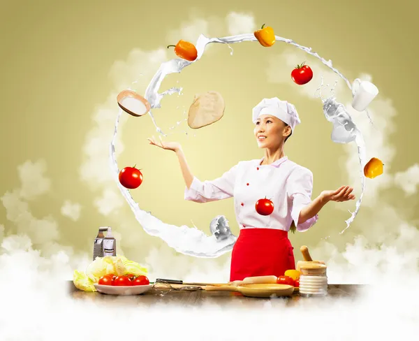 Juggler female cook — Stock Photo, Image