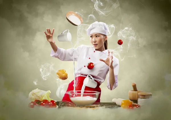 Azji kobieta gotowania z magii — Zdjęcie stockowe