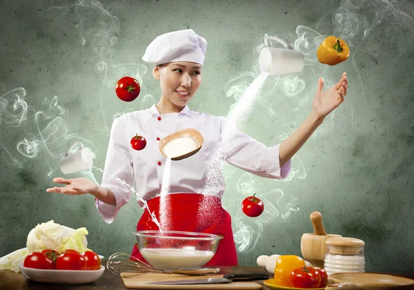 Cocina femenina asiática con magia —  Fotos de Stock