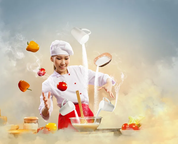 जादू के साथ एशियाई महिला खाना पकाना — स्टॉक फ़ोटो, इमेज