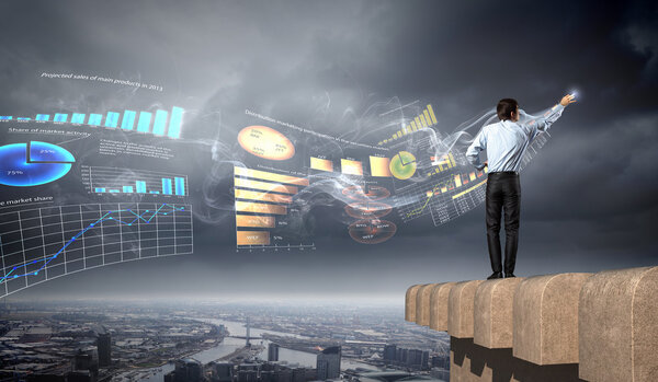 Businessman drawing diagram