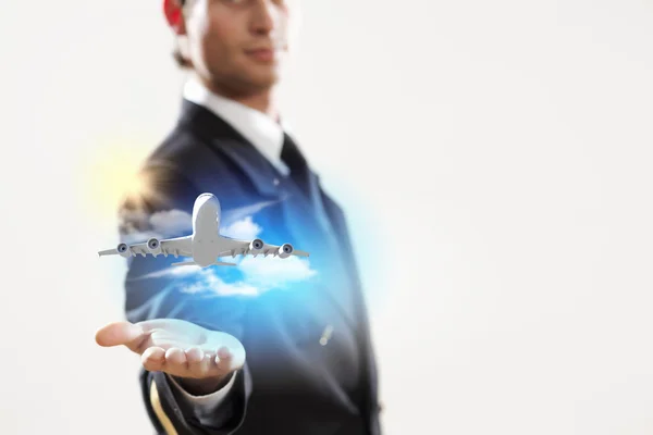 Image of pilot with plane in hand — Stock Photo, Image