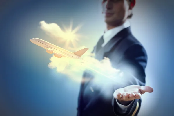 Image of pilot with plane in hand — Stock Photo, Image