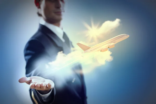 Image of pilot with plane in hand — Stock Photo, Image