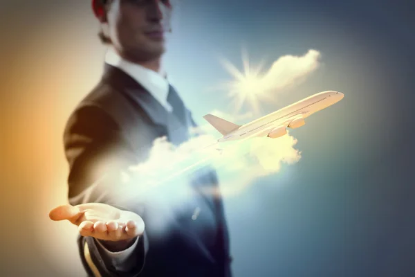 Image of pilot with plane in hand — Stock Photo, Image