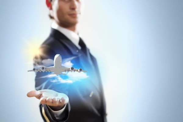 Image of pilot with plane in hand — Stock Photo, Image