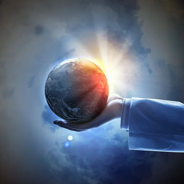 Image of earth planet on hand — Stock Photo, Image