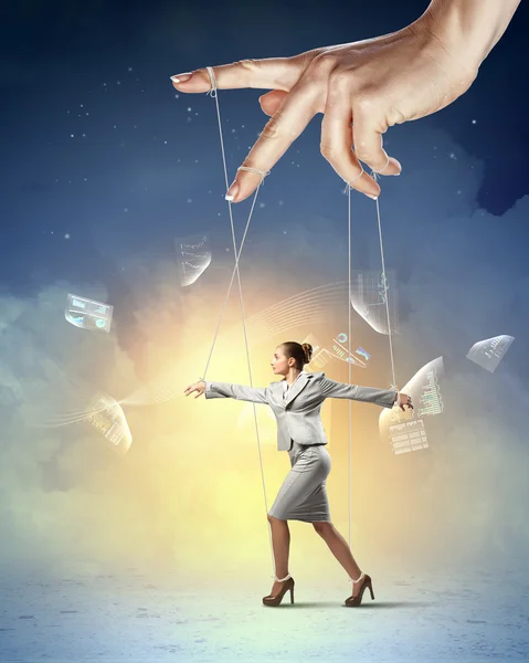 Business woman marionette — Stock Photo, Image