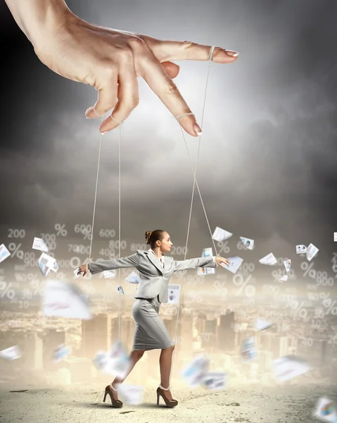 Business woman marionette — Stock Photo, Image