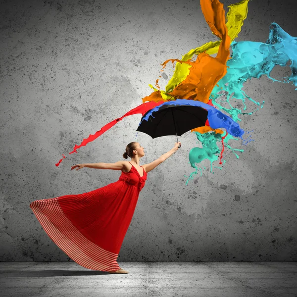 Ballet dancer in flying satin dress with umbrella — Stock Photo, Image