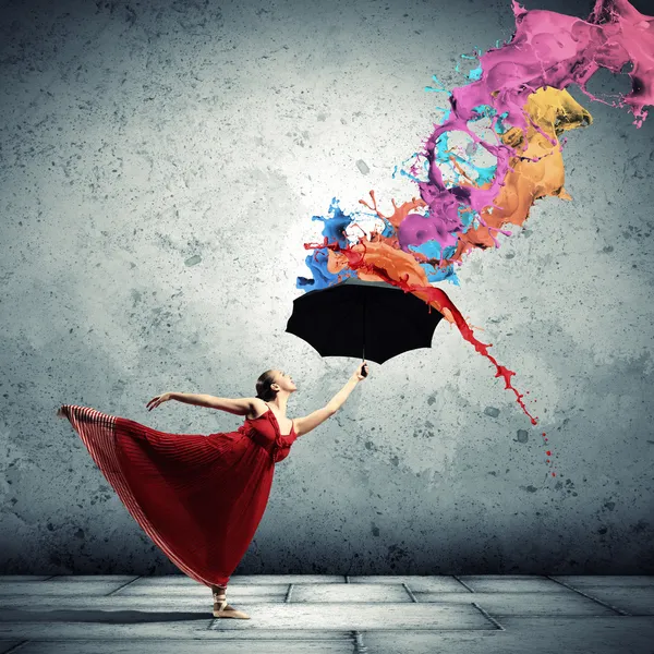 Ballet dancer in flying satin dress with umbrella — Stock Photo, Image