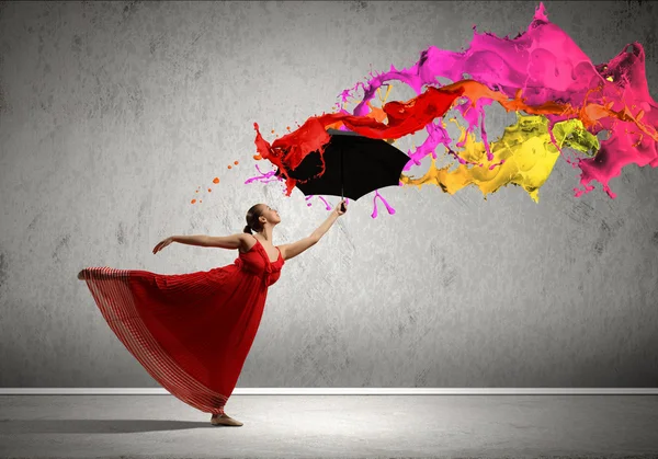 Ballet dancer in flying satin dress with umbrella — Stock Photo, Image