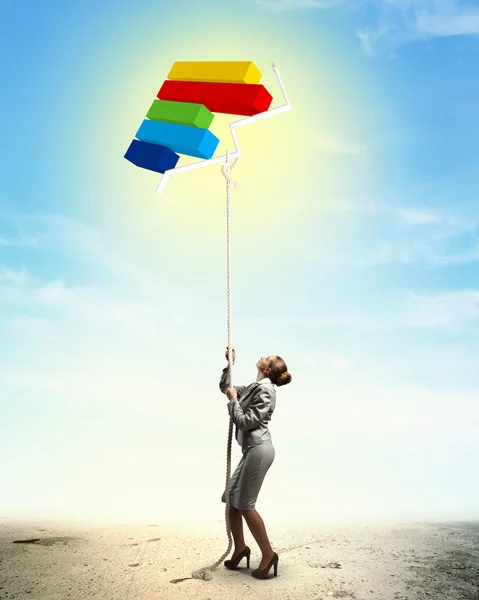 Image of businesswoman climbing the rope — Stock Photo, Image