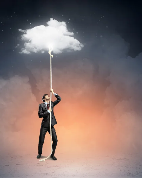 Image of businessman climbing rope — Stock Photo, Image