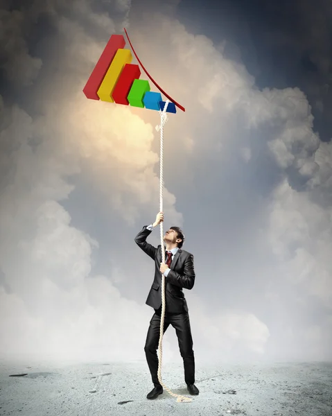 Image of businessman climbing rope — Stock Photo, Image