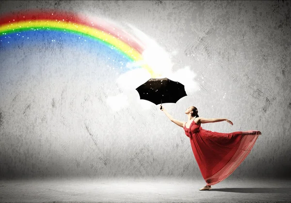 Ballet dancer in flying silk dress with umbrella — Stock Photo, Image