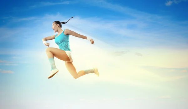 Obraz kobieta sport skoki — Zdjęcie stockowe