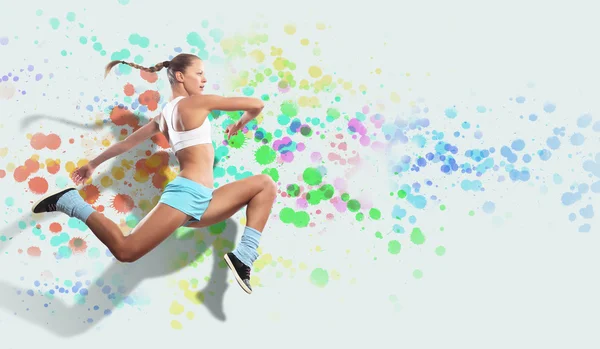 Afbeelding van sport vrouw springen — Stockfoto