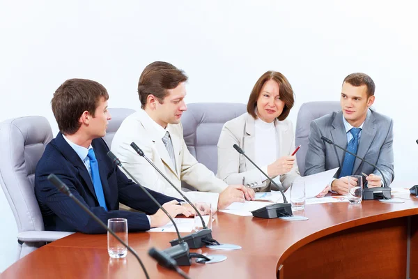 Vier ondernemers tijdens vergadering — Stockfoto