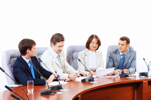 Cuatro empresarios en la reunión — Foto de Stock