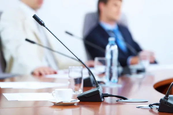 Microphone on table at conference — Stock Photo, Image