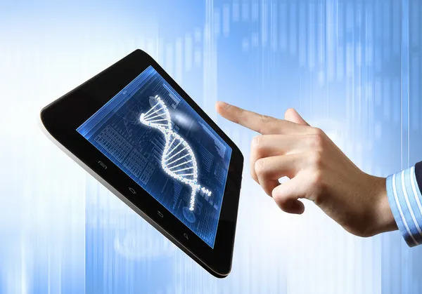 Dna strand On The Tablet Screen — Stock Photo, Image