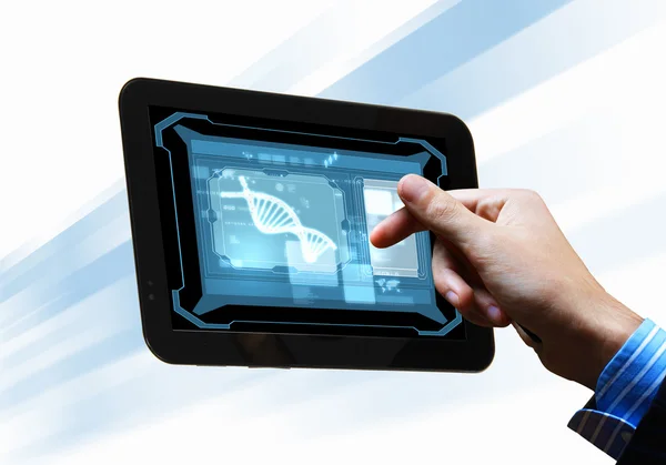 DNA iplikçik tablet ekranında — Stok fotoğraf