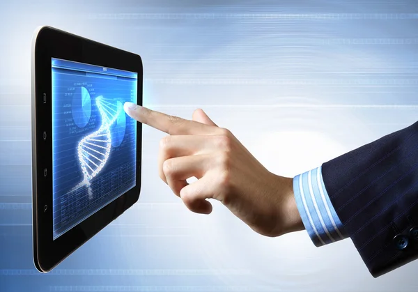 Bundel van DNA op de Tablet PC-scherm — Stockfoto