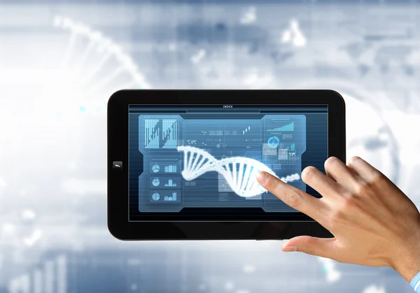 Dna strand On The Tablet Screen — Stock Photo, Image