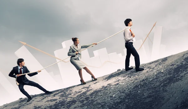 Three business pulling rope — Stock Photo, Image