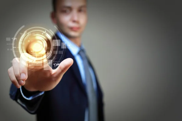 Hombre de negocios tocando pantalla Imagen de stock