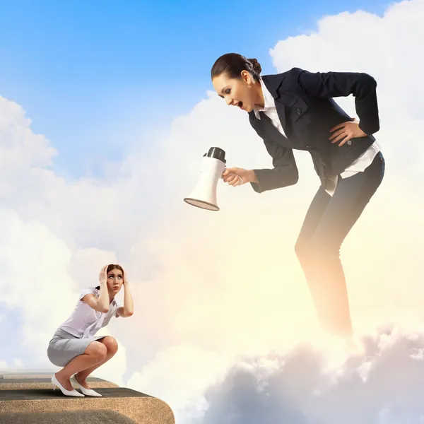 Businesswoman with megaphone — Stock Photo, Image