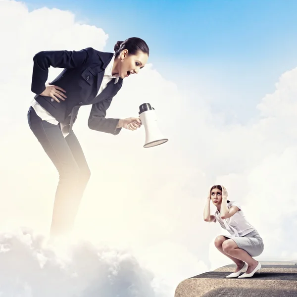 Businesswoman with megaphone — Stock Photo, Image