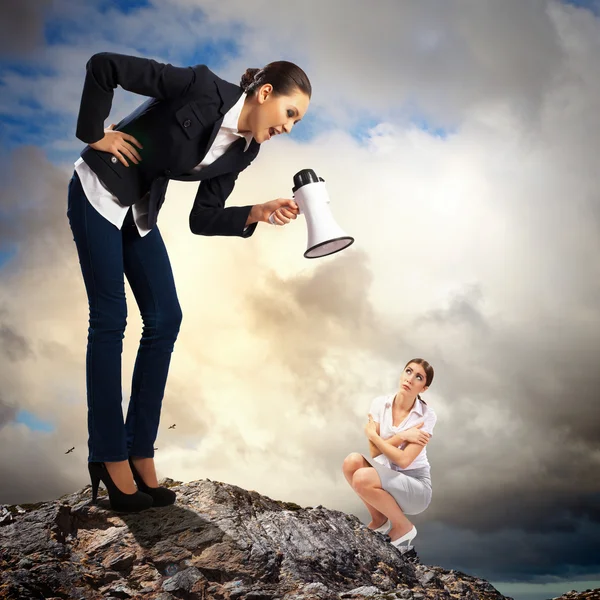 Businesswoman with megaphone — Stock Photo, Image