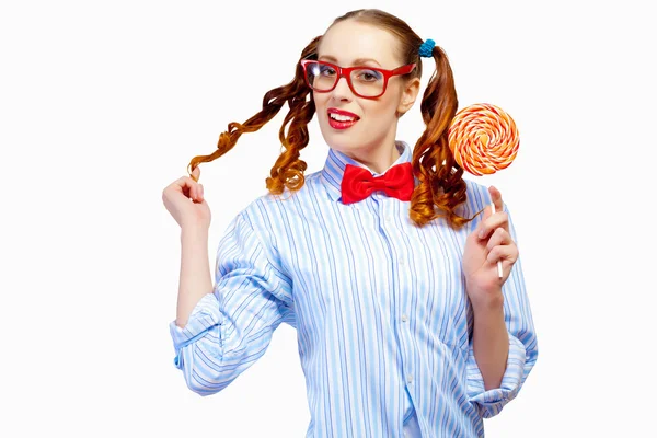 Young woman holding candy — Stock Photo, Image