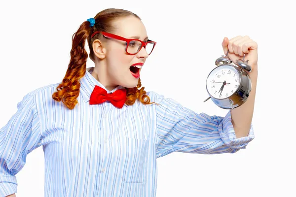 Teenager girl holding alarm clock — Stock Photo, Image