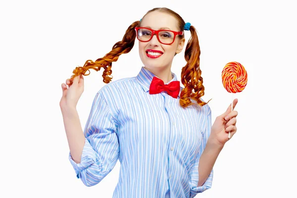 Young woman holding candy — Stock Photo, Image