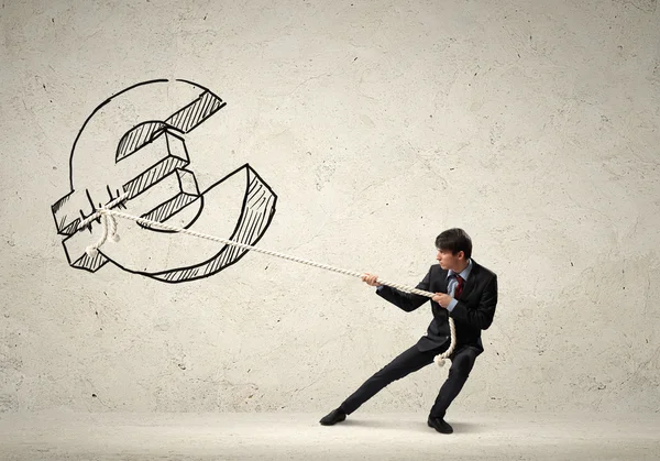 Businessman pulling rope — Stock Photo, Image