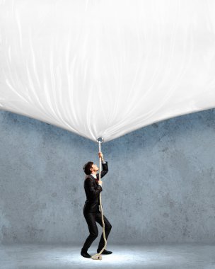 işadamı çekerek afiş