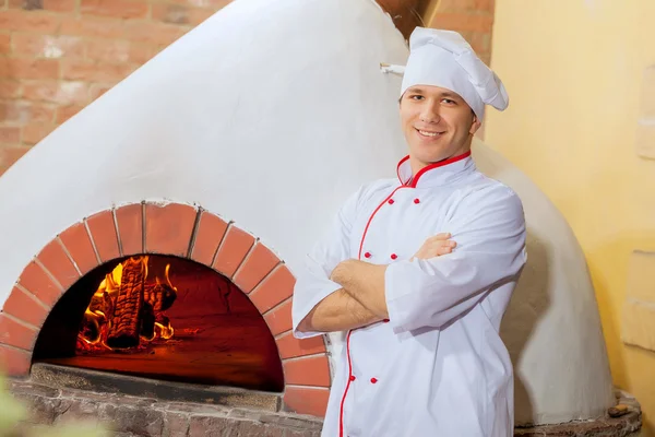 Jonge mannelijke kok — Stockfoto