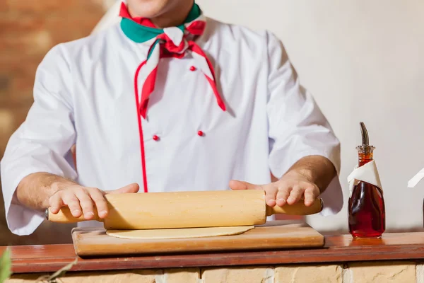 Chef rolling dough — Stock Photo, Image