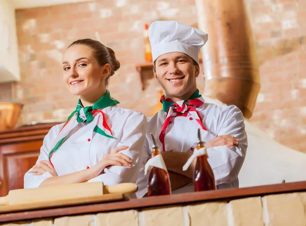 Portrait of two cooks with crossed arms — Stock Photo, Image