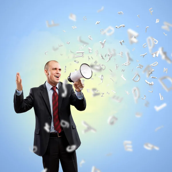 Businessman with megaphone — Stock Photo, Image