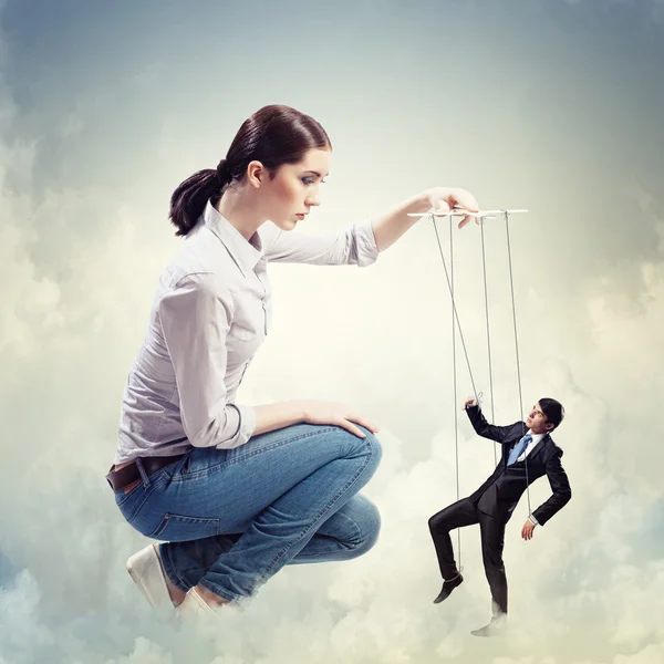 Businesswoman puppeteer — Stock Photo, Image