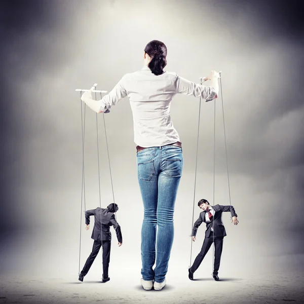 Businesswoman puppeteer — Stock Photo, Image